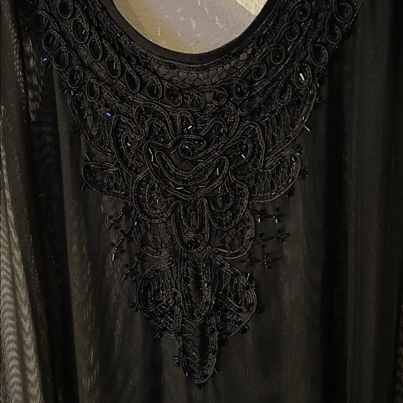 Elegant Black Sheer Dress with Lace Detail - Picture 7 of 16